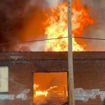 ‘Heavy’ industrial fire in Cleveland spread to homes