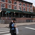 Driver rams car repeatedly into doors of NYC Jewish site, suspect detained